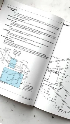 An open book showing technical documentation for a curved platform lift application.