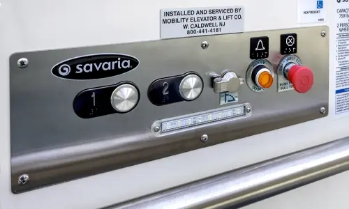 Cab interior buttons of the V-1504 vertical platform lift.